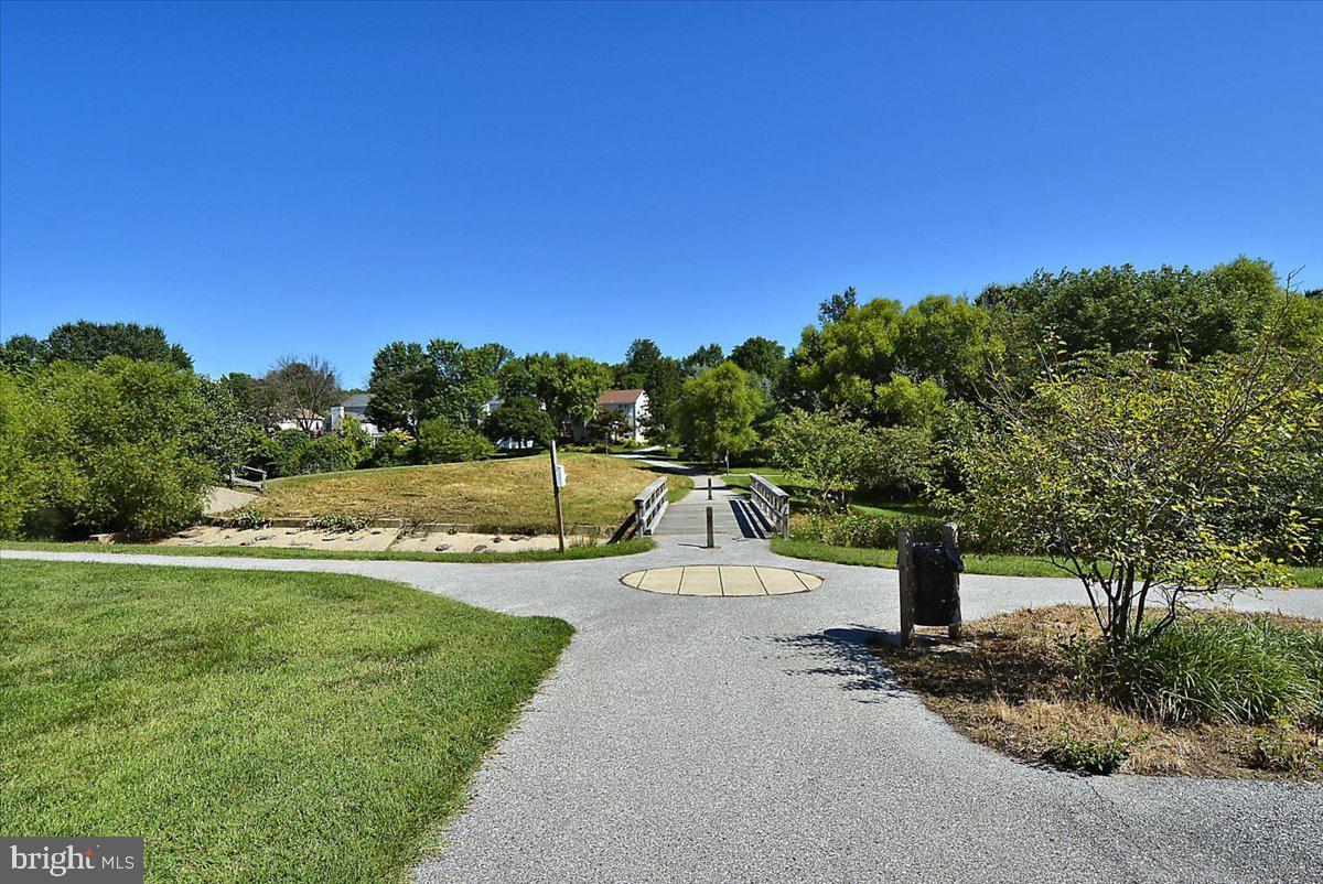 6413 White Peach Place Columbia, MD 21045 - Photo 25 of 31 a view of a park with large trees