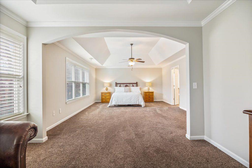 4965 Cheltenham Place Cumming, GA 30041 - Photo 18 of 47 a view of livingroom with furniture and windows