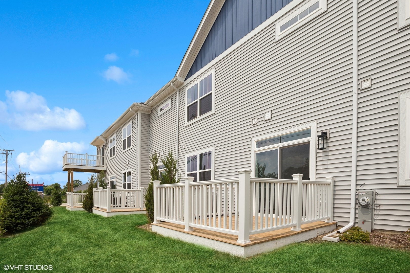 253 Masters Drive Addison, IL 60101 - Photo 15 of 17 a view of a house with a yard and deck