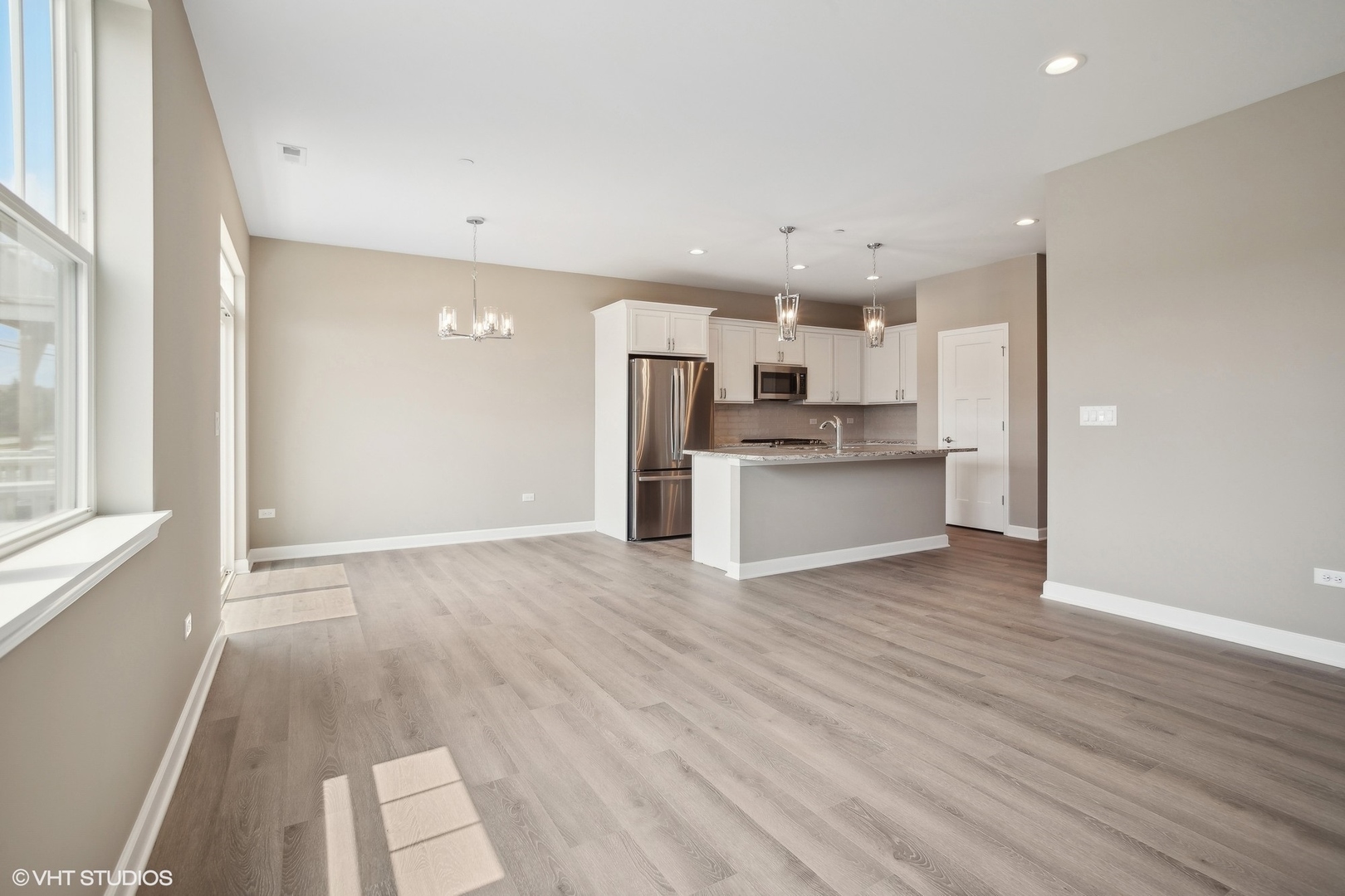 253 Masters Drive Addison, IL 60101 - Photo 3 of 17 a view of kitchen with wooden floor