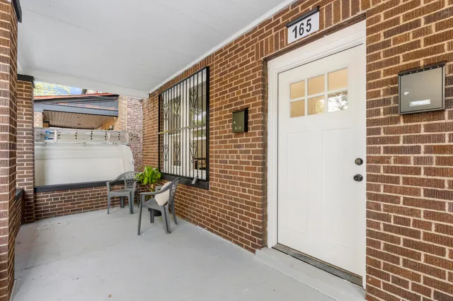 a building outdoor space with patio furniture