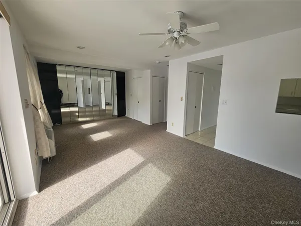 a view of a livingroom with a flat screen tv