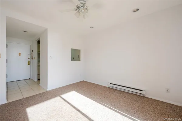 a view of a room with an empty space