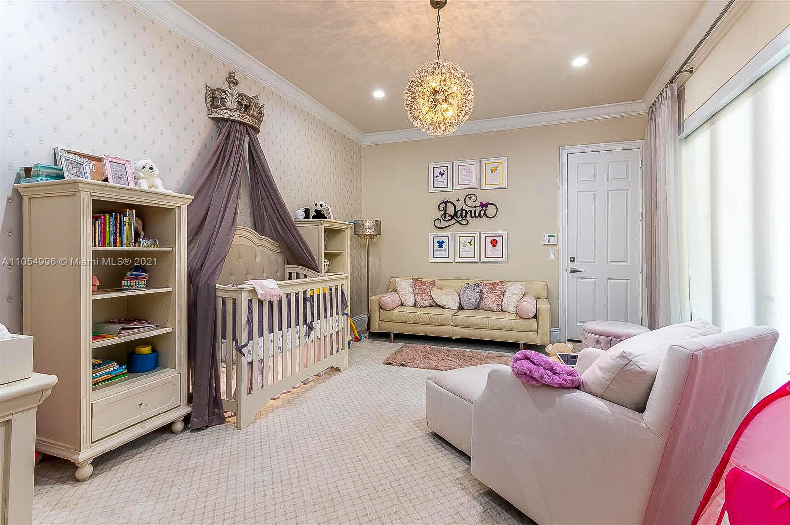 17766 Cadena Drive Boca Raton, FL 33496 - Photo 19 of 28 a bedroom with furniture and a chandelier