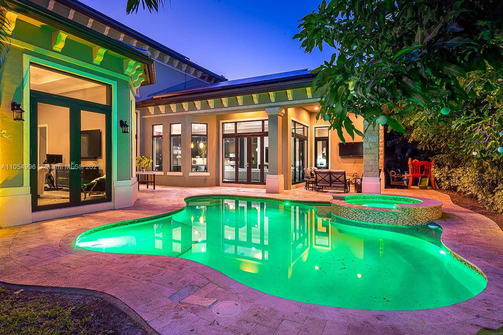 17766 Cadena Drive Boca Raton, FL 33496 - Photo 28 of 28 a view of a swimming pool with an outdoor seating