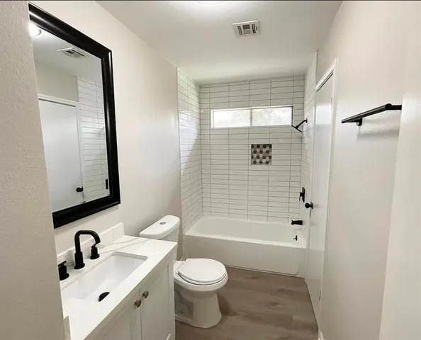 a view of a room that has a window