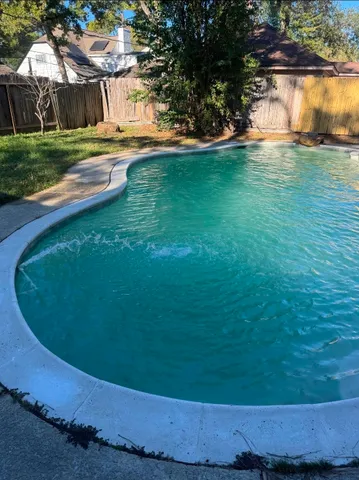 a view of a garden with an outdoor space