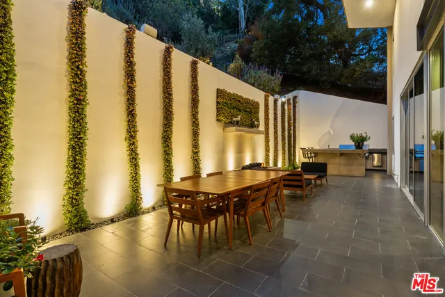 a view of house and outdoor space with swimming pool