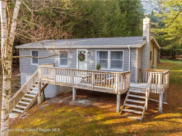 front view of a house with a deck