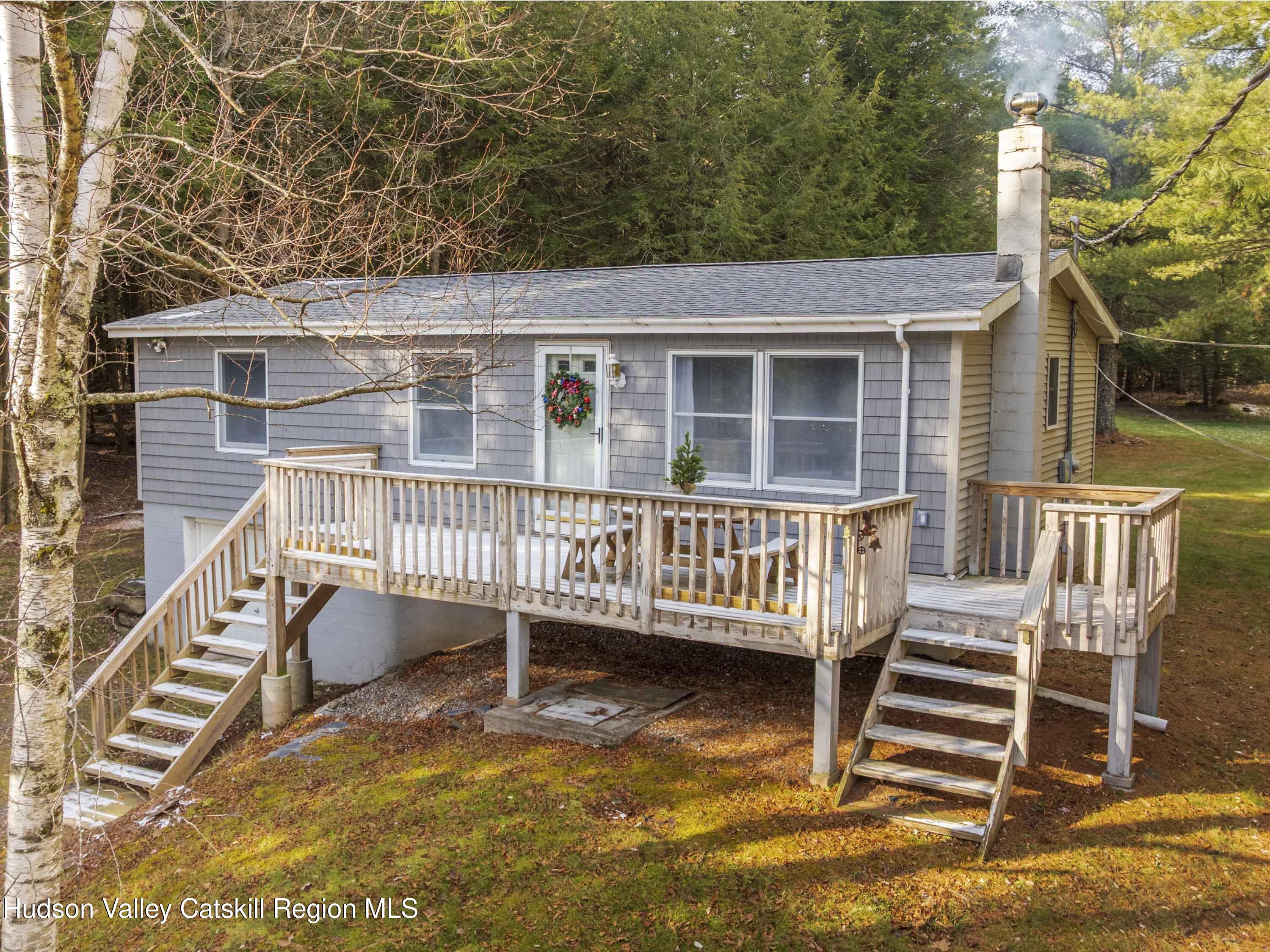 front view of a house with a deck