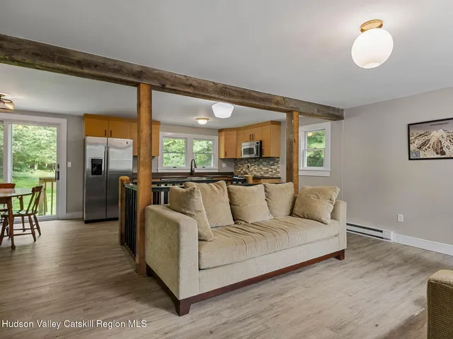 a spacious bedroom with a toilet and a shower