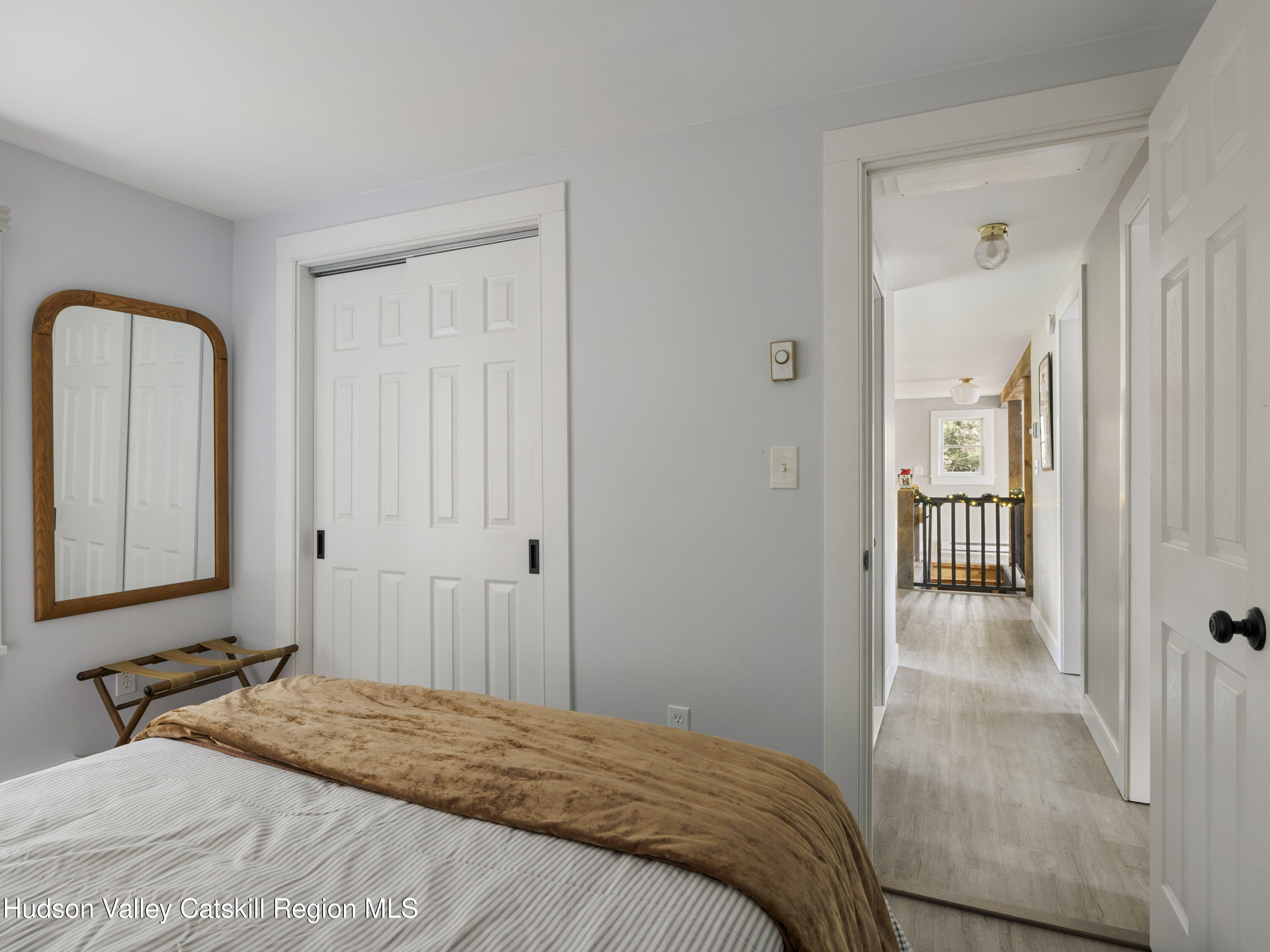 61 Hemlock Road Jewett, NY 12444 - Photo 22 of 45 a bedroom with a bed and a mirror