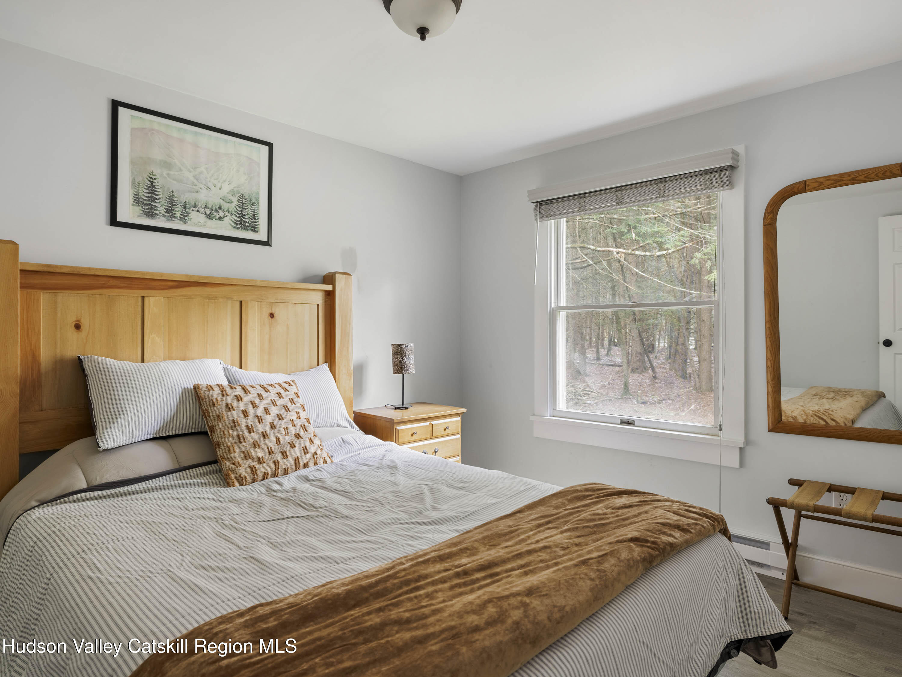 61 Hemlock Road Jewett, NY 12444 - Photo 23 of 45 a bedroom with a bed and window