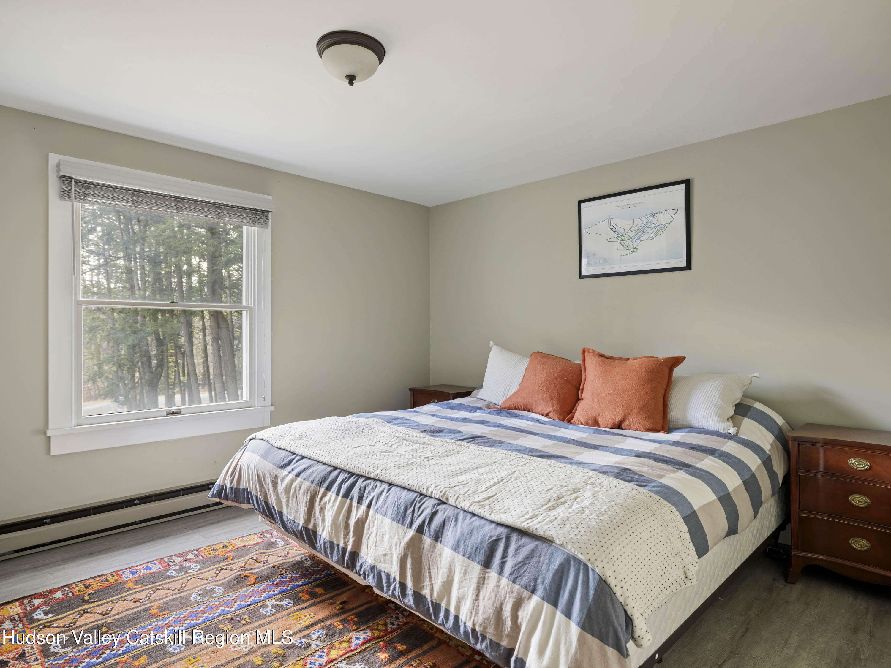 61 Hemlock Road Jewett, NY 12444 - Photo 24 of 45 a bedroom with a bed and a window