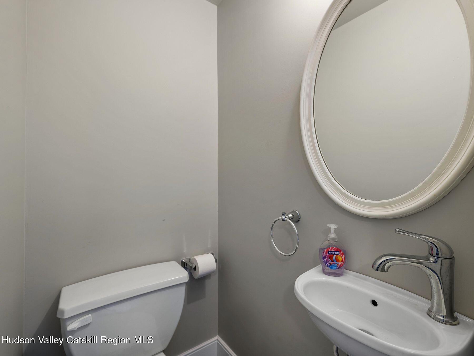 61 Hemlock Road Jewett, NY 12444 - Photo 27 of 45 a bathroom with a toilet sink and mirror