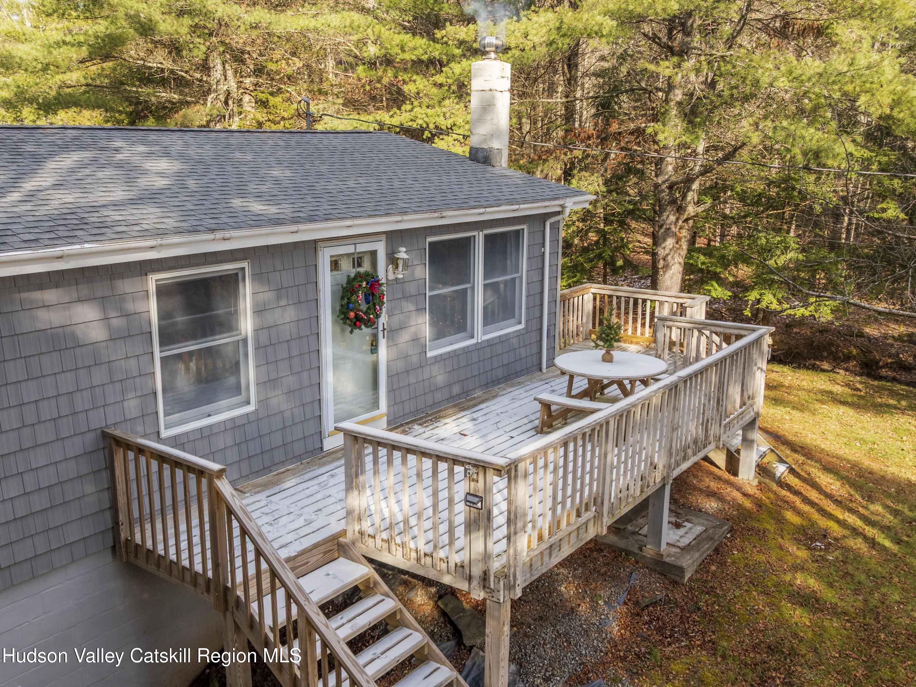 61 Hemlock Road Jewett, NY 12444 - Photo 35 of 45 a balcony with table and chairs