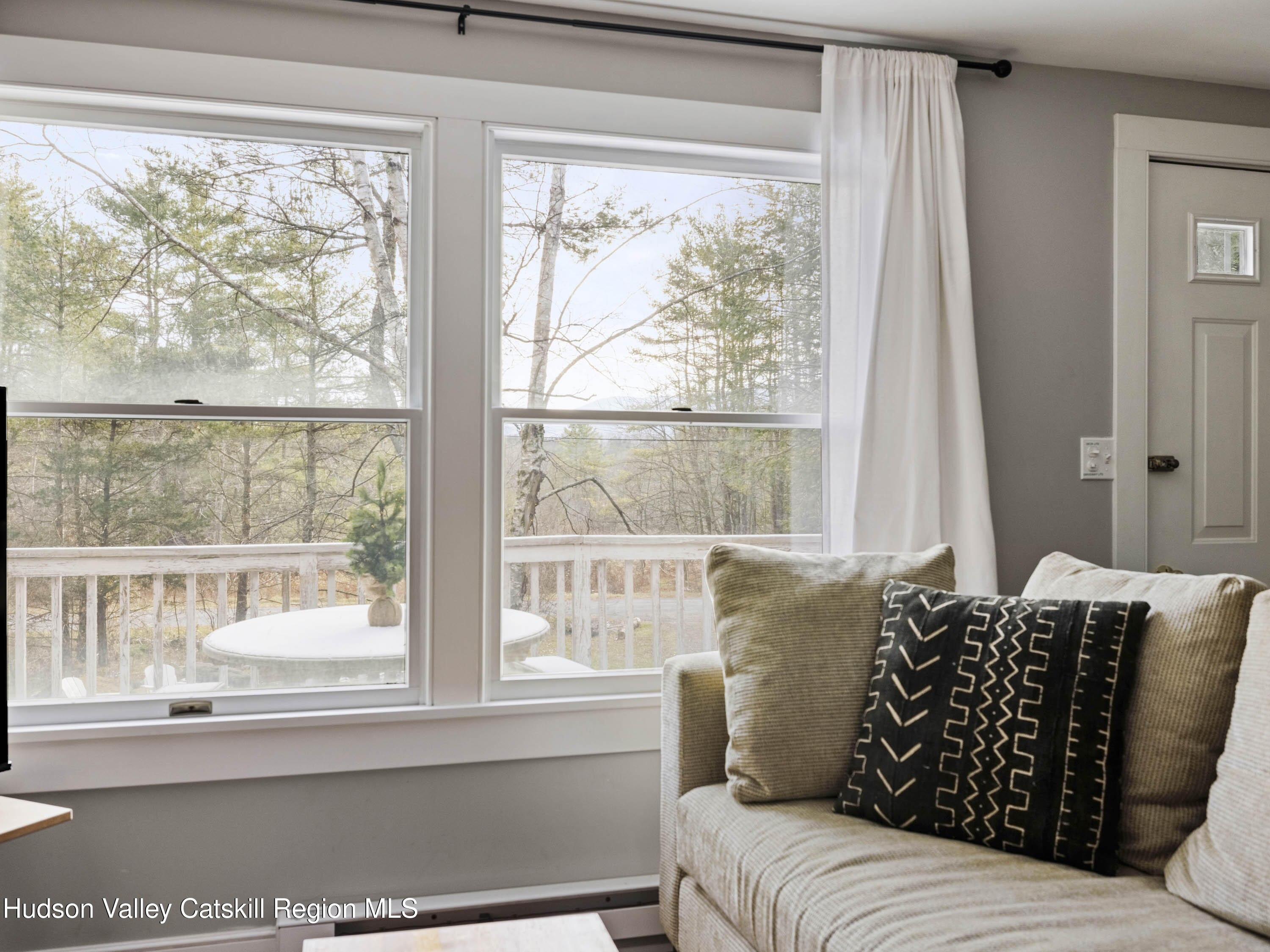 61 Hemlock Road Jewett, NY 12444 - Photo 7 of 45 a living room with furniture and a window