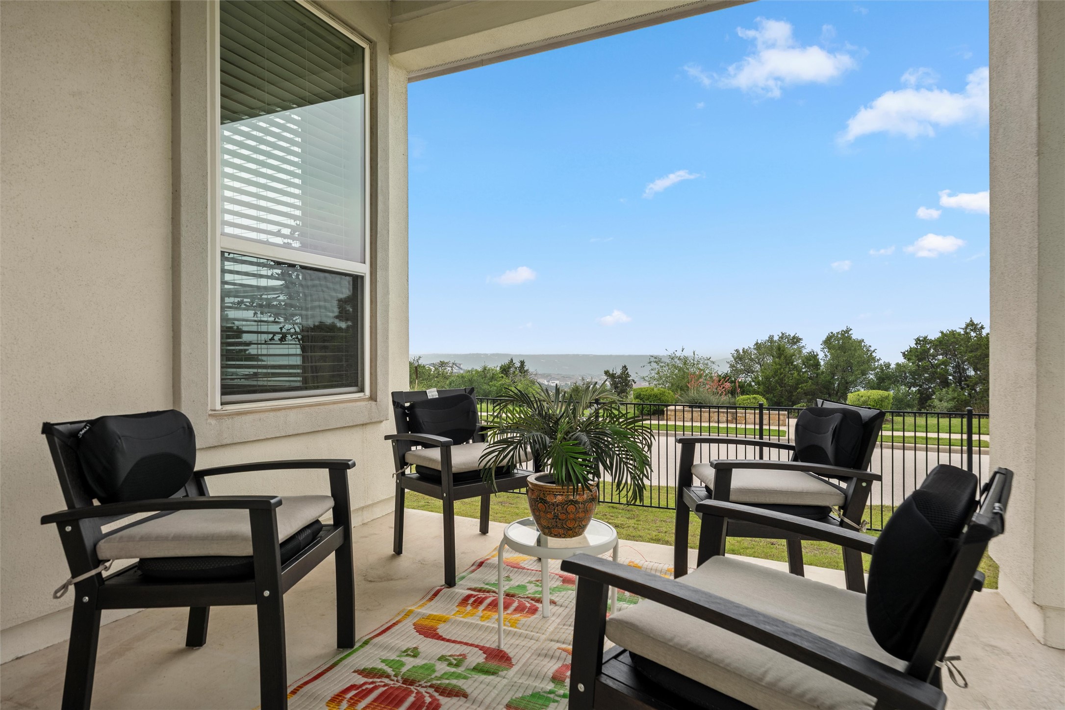 1733 Siena Sunset Road Leander, TX 78641 - Photo 2 of 40 Covered outdoor patio with great hill country and sunset views
