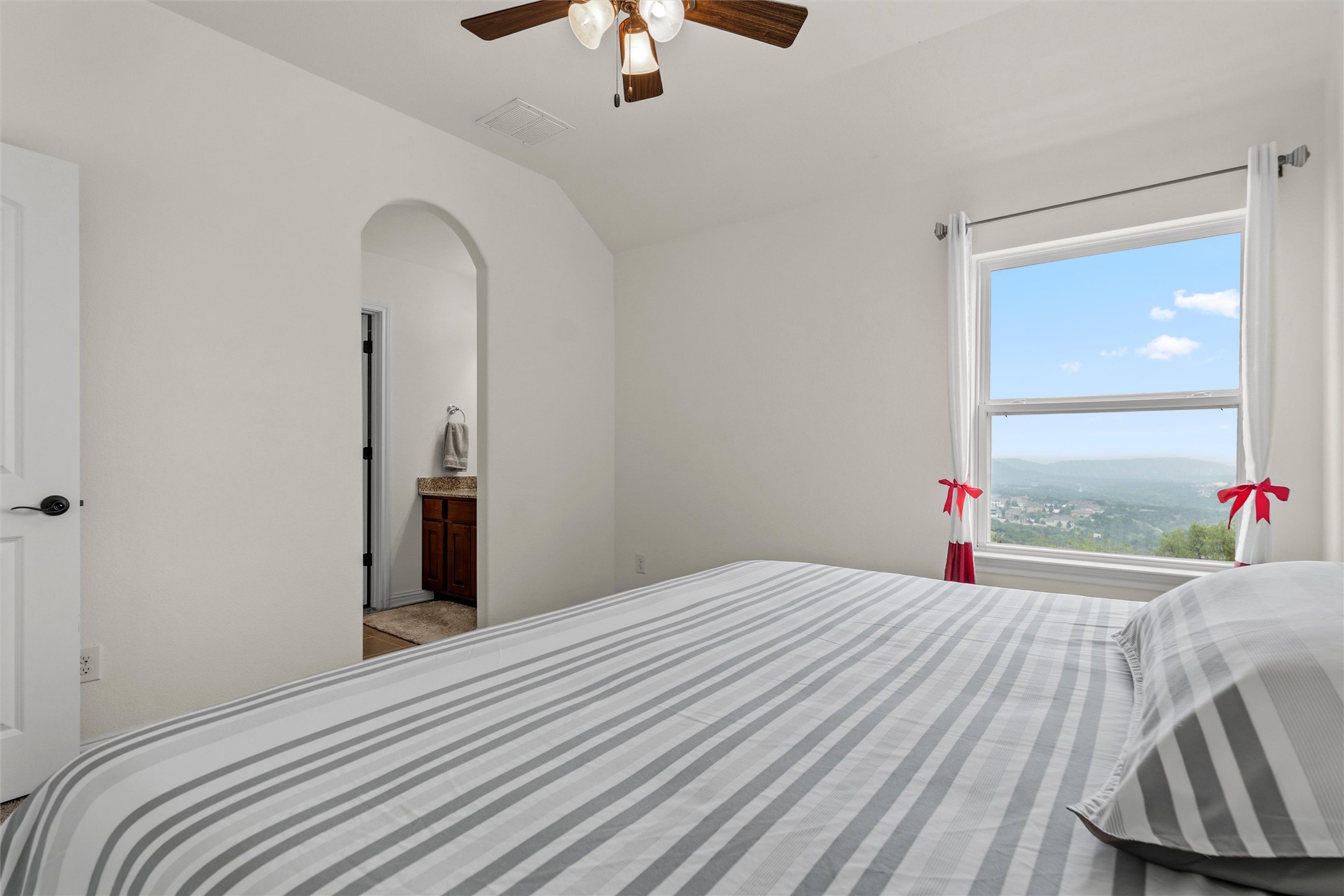 1733 Siena Sunset Road Leander, TX 78641 - Photo 36 of 40 Second Bedroom upstairs with great hill country and sunset views