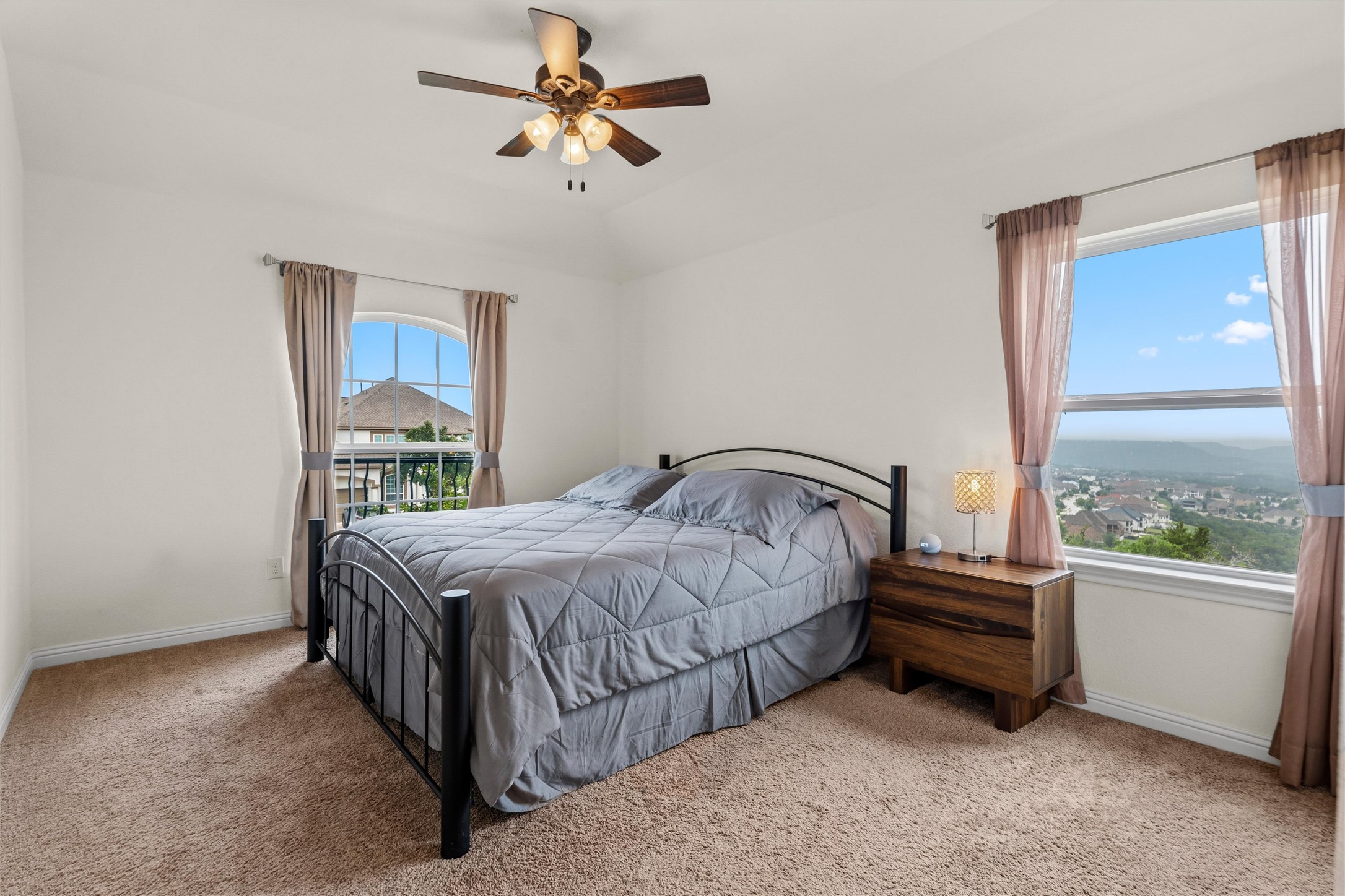 1733 Siena Sunset Road Leander, TX 78641 - Photo 37 of 40 Third Bedroom upstairs with great hill country and sunset views