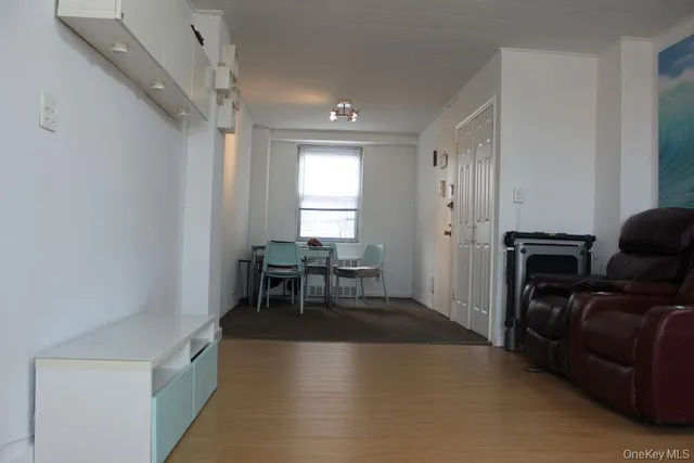 a view of a livingroom with furniture and windows