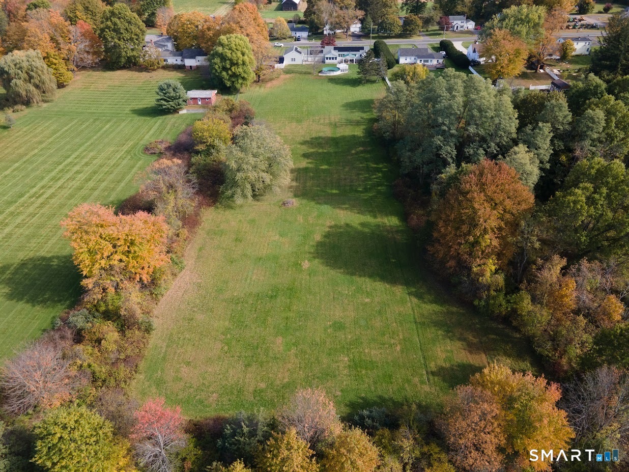 763 North Street Suffield, CT 06078 - Photo 3 of 40 a view of a lake with large trees