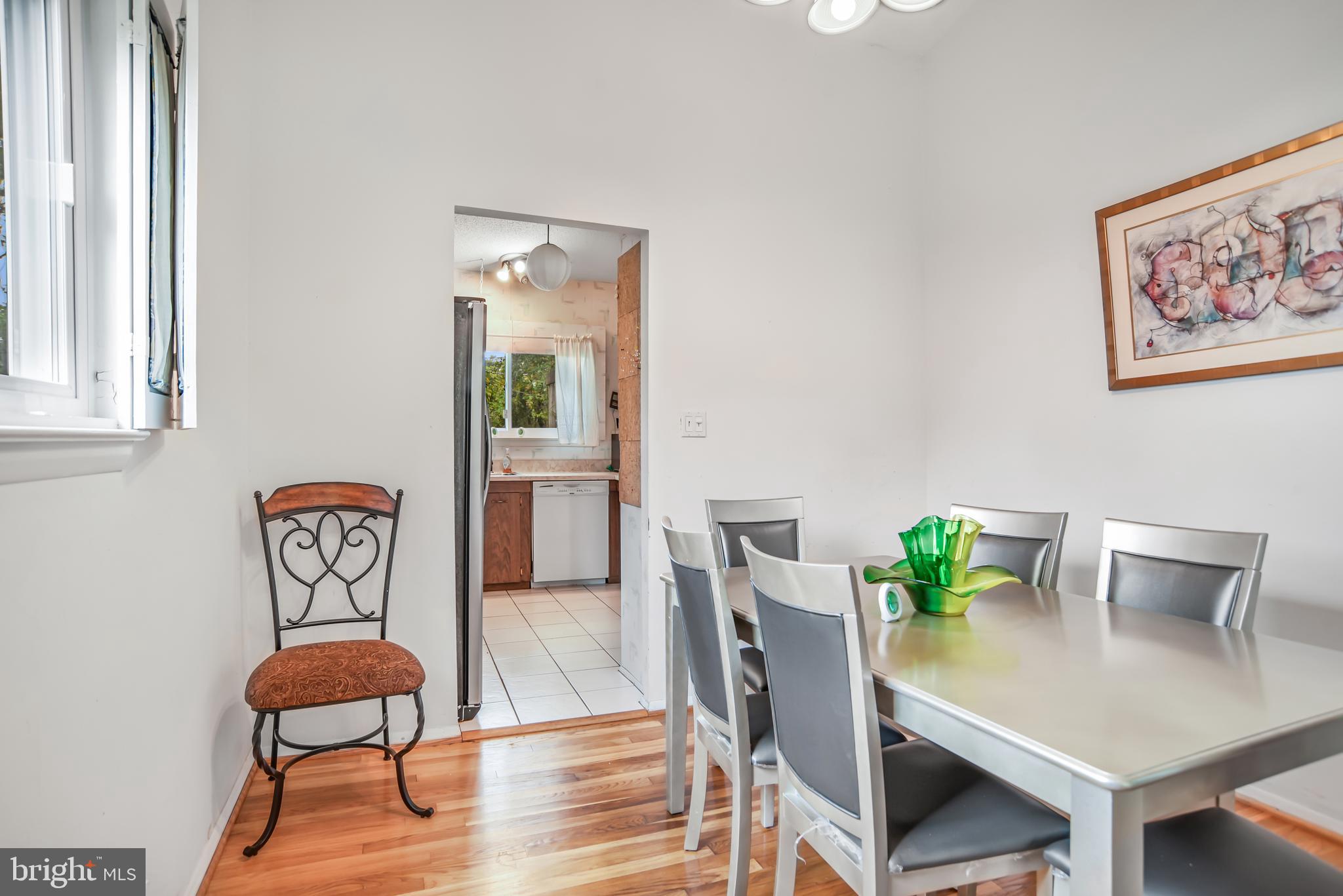 8239 Brattle Road Pikesville, MD 21208 - Photo 11 of 27 Dining room with cathedral ceiling