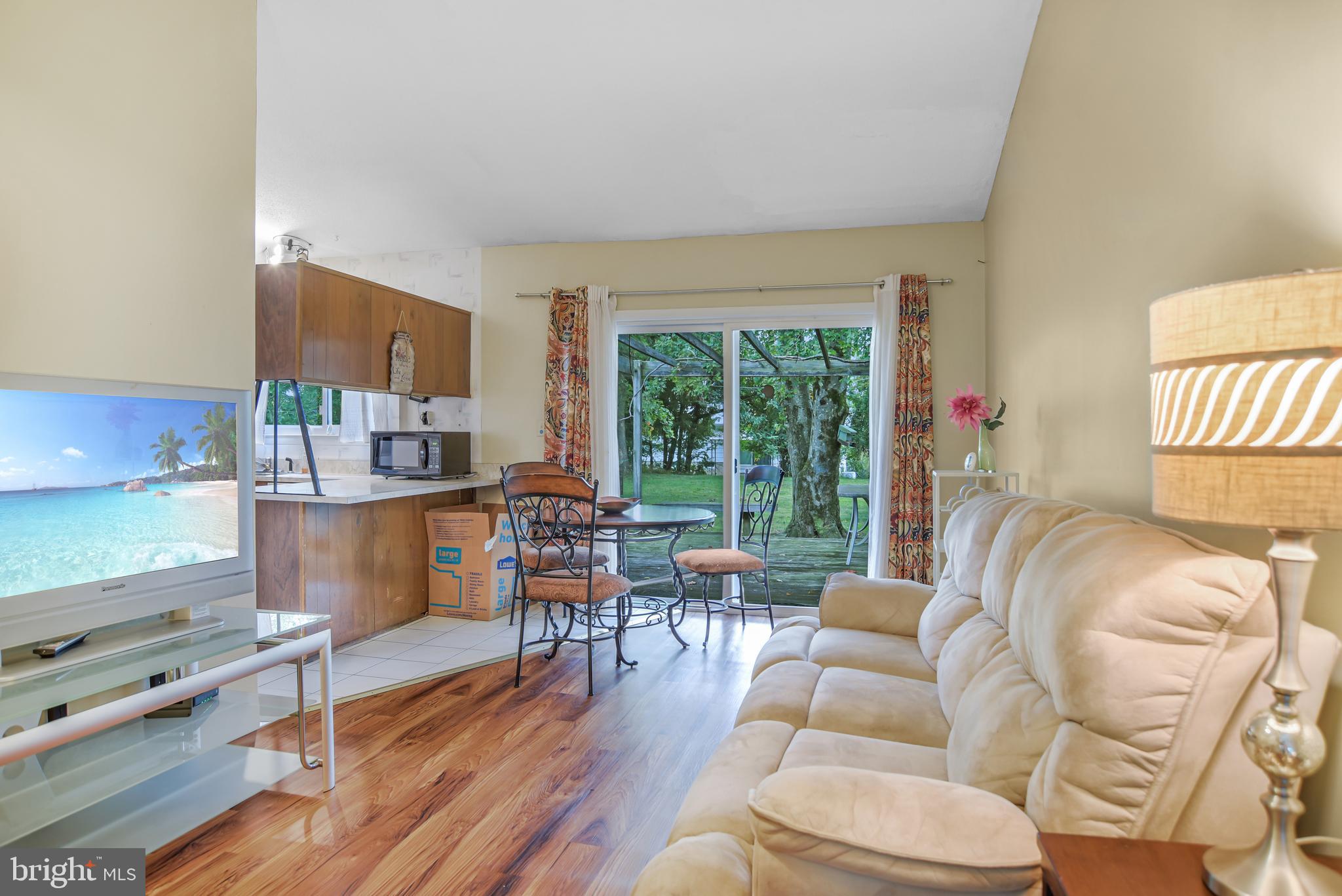 8239 Brattle Road Pikesville, MD 21208 - Photo 7 of 27 Familyroom off of the kitchen