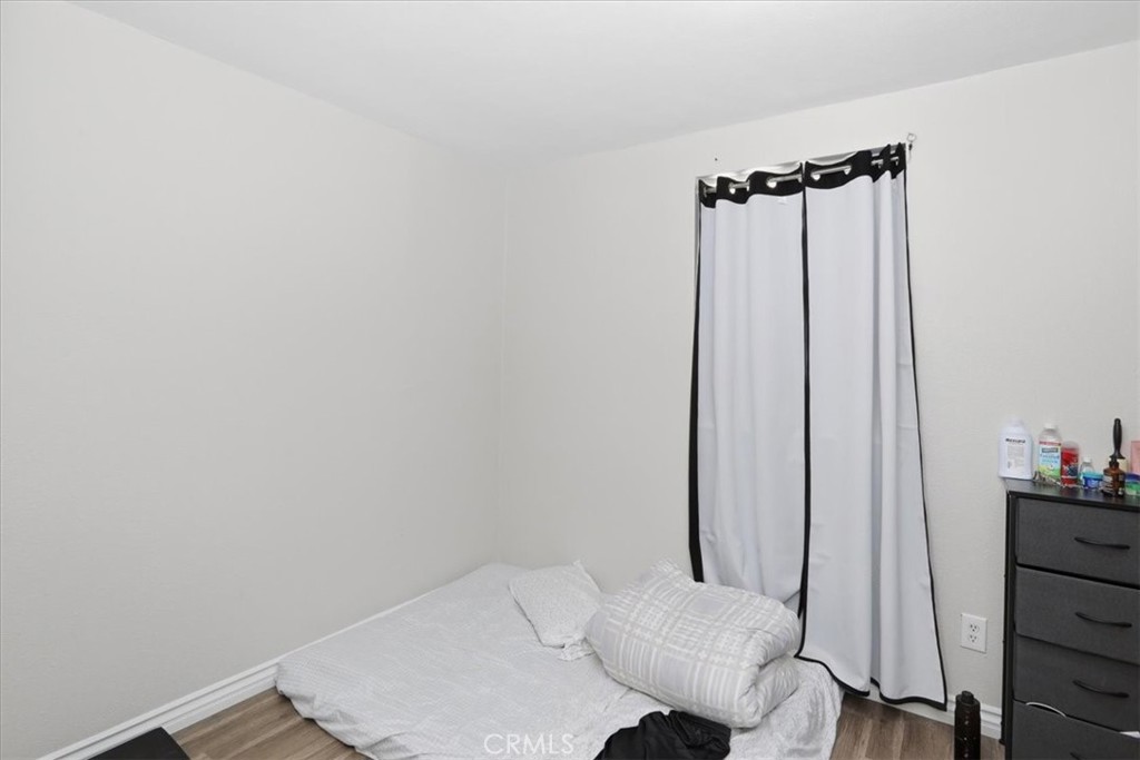 245 Commercial Avenue Riverside, CA 92507 - Photo 15 of 30 a bathroom with a sink toilet and shower