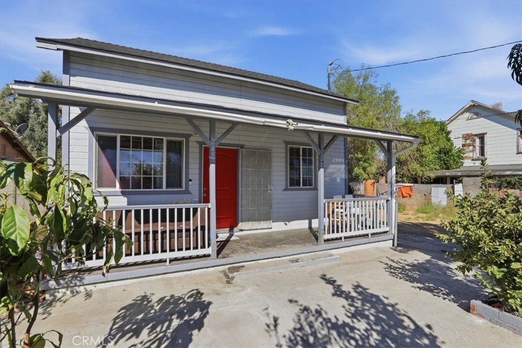 245 Commercial Avenue Riverside, CA 92507 - Photo 2 of 30 front view of a house with a fence