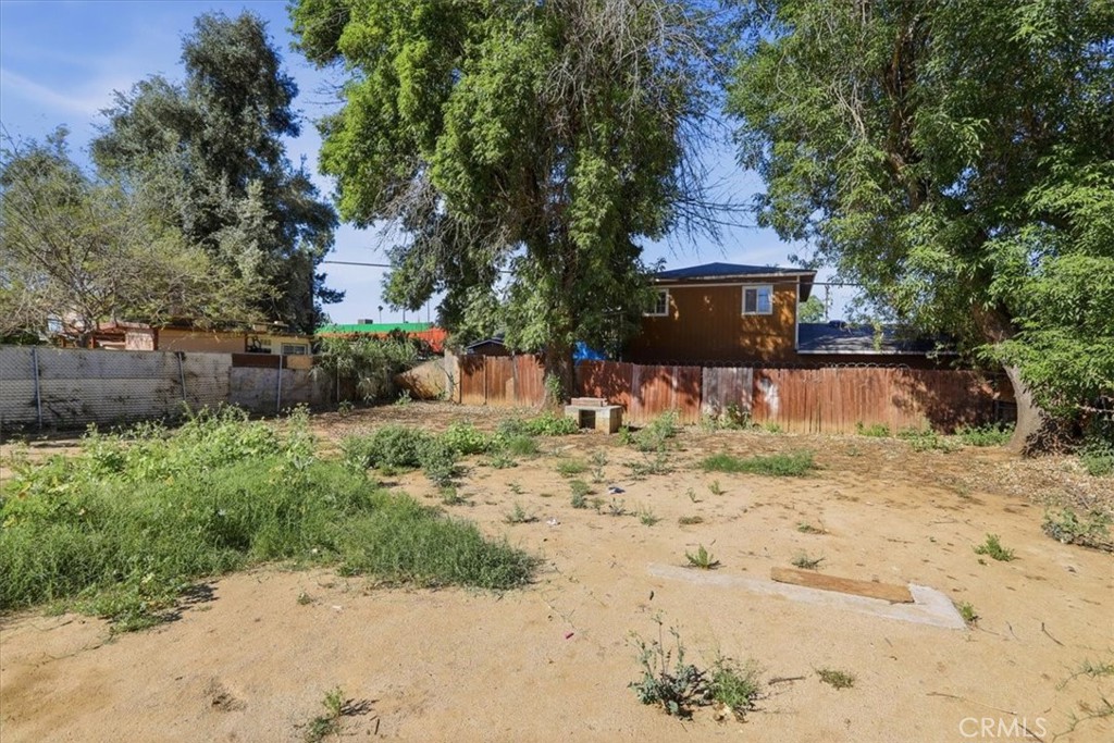 245 Commercial Avenue Riverside, CA 92507 - Photo 30 of 30 a view of a house with a yard covered in snow