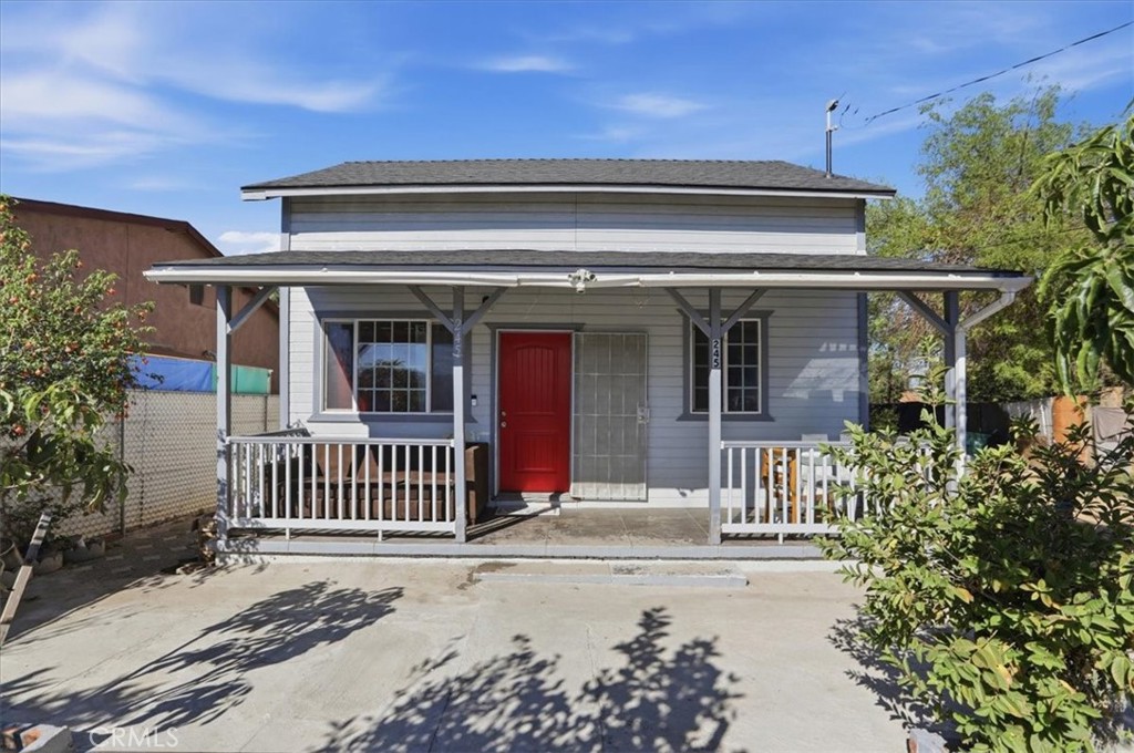 245 Commercial Avenue Riverside, CA 92507 - Photo 3 of 30 a front view of a house with a porch