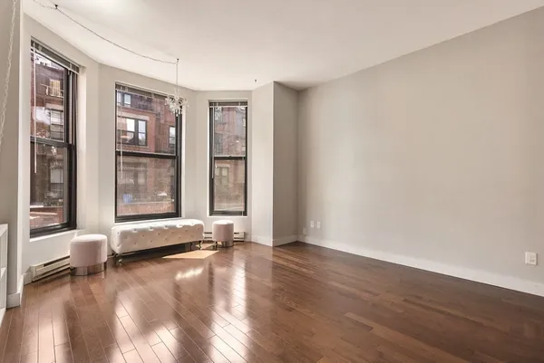 a view of livingroom with hardwood floor and window
