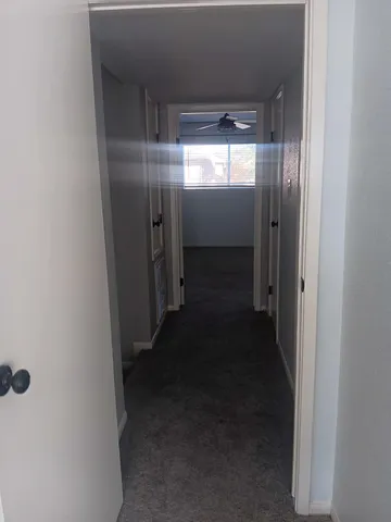 a view of an empty room and window