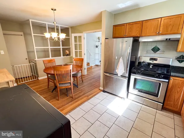 a view of staircase with white walls