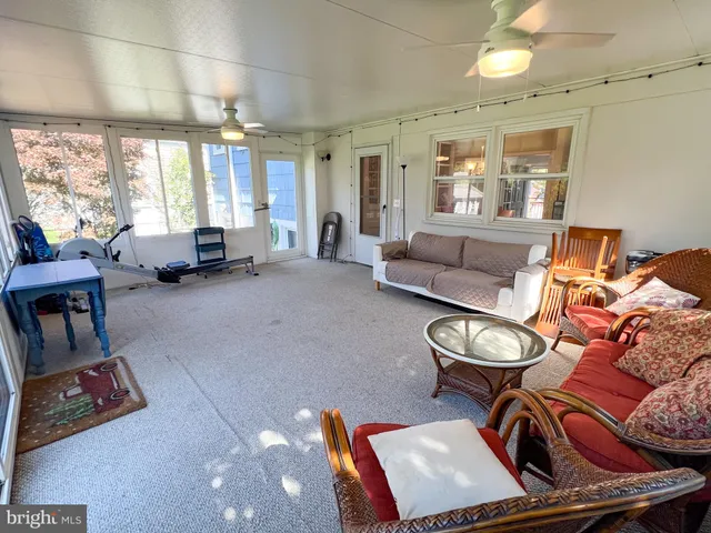 a bedroom with a bed and a dresser in it