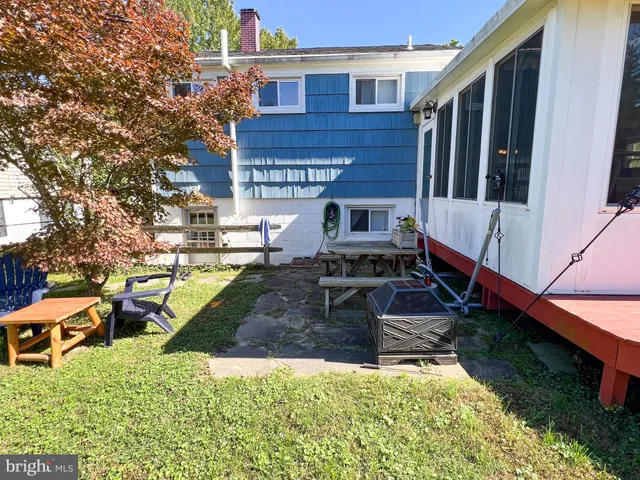 a bedroom with a bed and a table in it