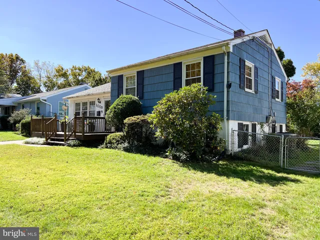 a view of a deck with wooden floor and outdoor seating
