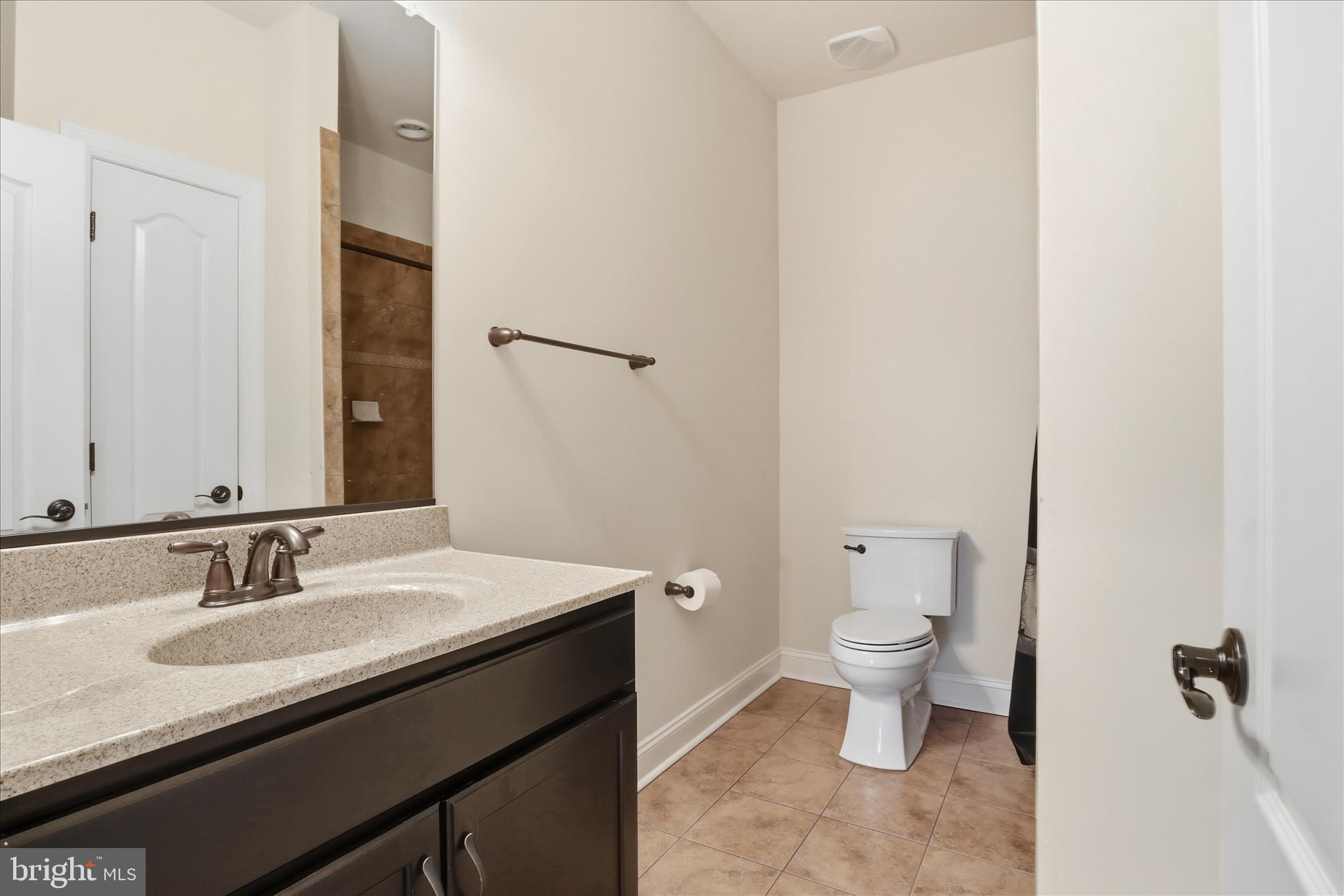 7501 Clifton Road Clifton, VA 20124 - Photo 44 of 93 a bathroom with a sink and a toilet