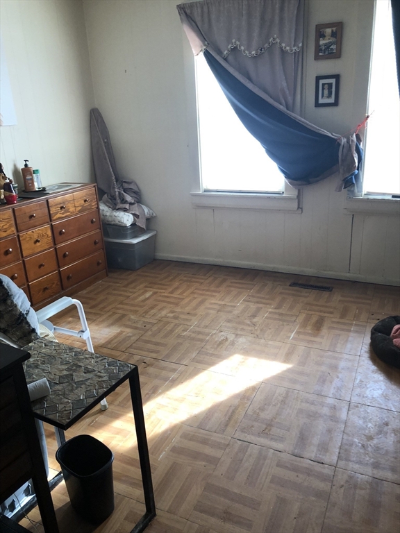 266 Pleasant Street Franklin, MA 02038 - Photo 9 of 15 a living room with furniture
