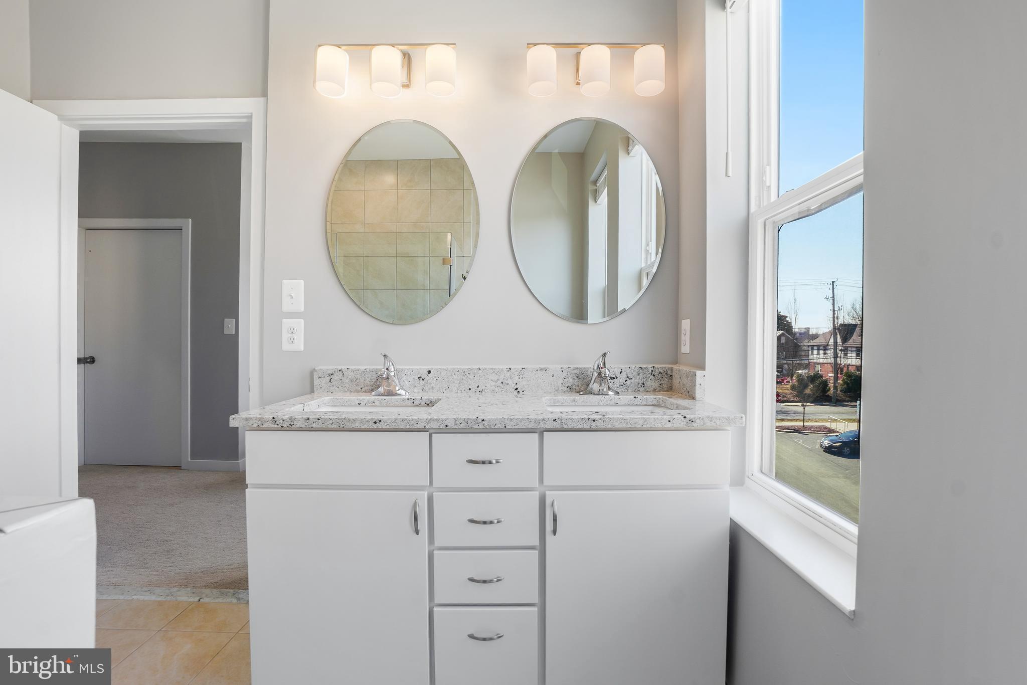 8012 Grove Street Silver Spring, MD 20910 - Photo 21 of 38 Primary Bathroom with with a Dual-Sink Vanity