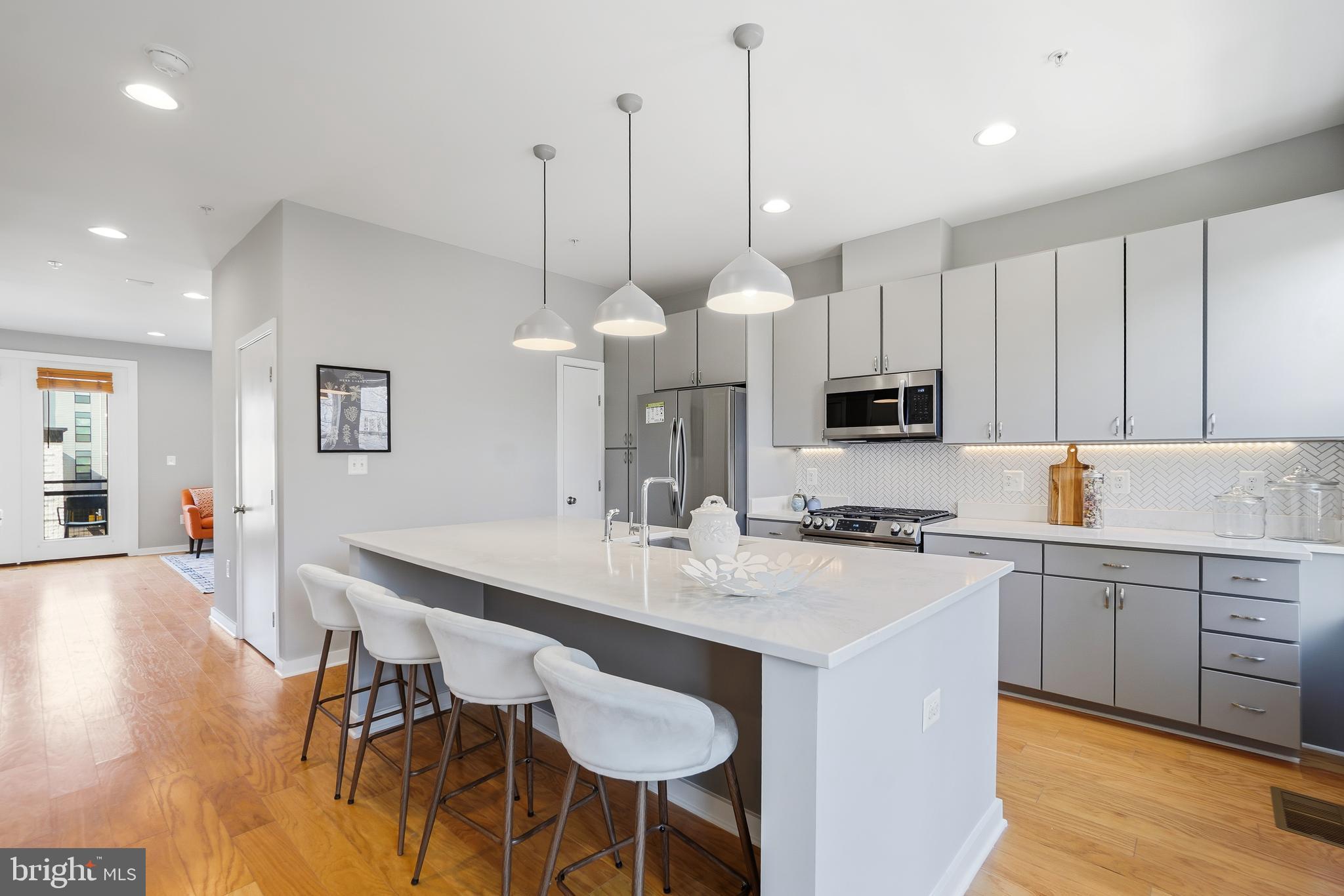 8012 Grove Street Silver Spring, MD 20910 - Photo 6 of 38 Breakfast Bar with Pendant Lighting