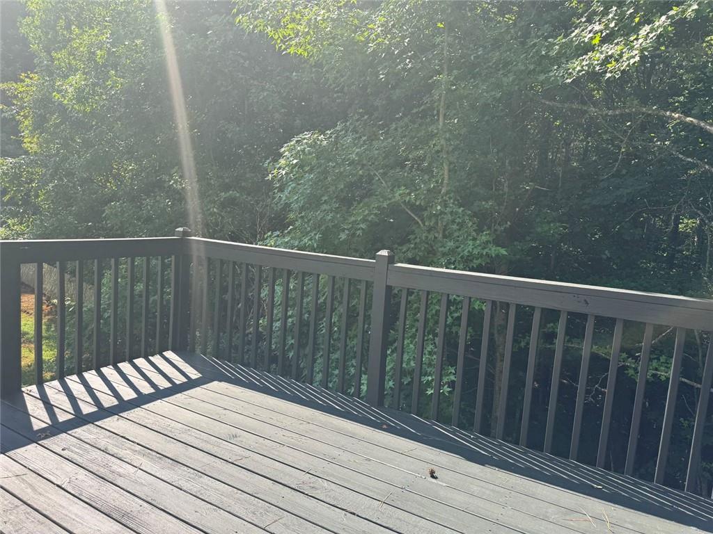 4044 Robin Circle Atlanta, GA 30349 - Photo 12 of 12 a view of balcony with wooden floor