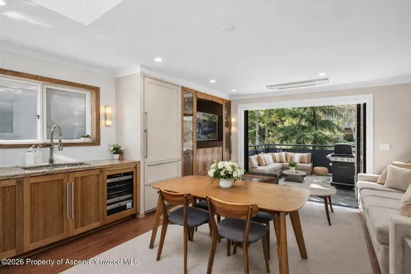 a kitchen with stainless steel appliances granite countertop a stove and a refrigerator