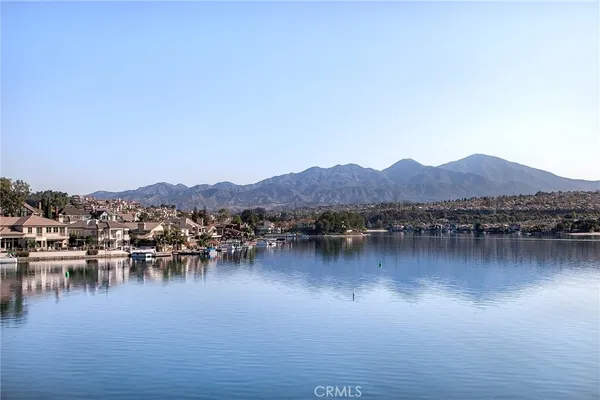 a view of a large body of water with a mountain in the background