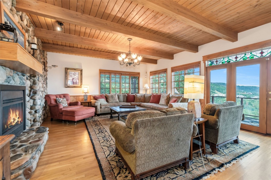 2300 Glacier Ridge Steamboat Springs, CO 80487 - Photo 14 of 50 a living room with furniture and a fireplace