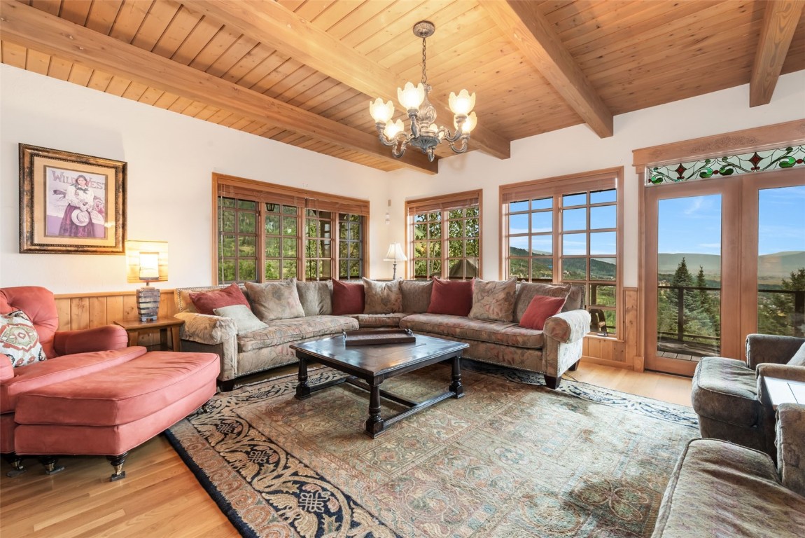 2300 Glacier Ridge Steamboat Springs, CO 80487 - Photo 15 of 50 a living room with patio furniture and a large window