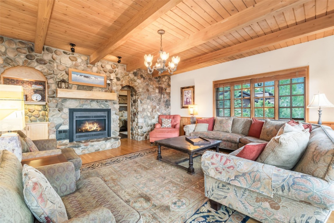2300 Glacier Ridge Steamboat Springs, CO 80487 - Photo 17 of 50 a living room with furniture and a fireplace