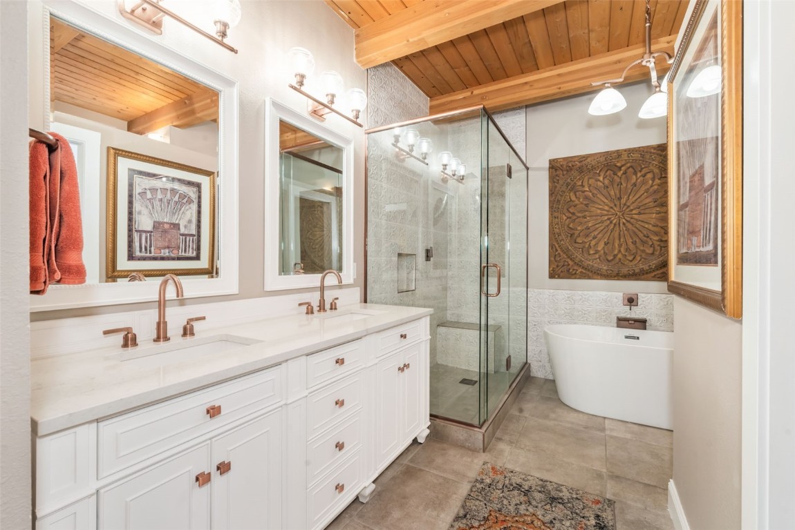 2300 Glacier Ridge Steamboat Springs, CO 80487 - Photo 23 of 50 a spacious bathroom with a double vanity sink mirror and double