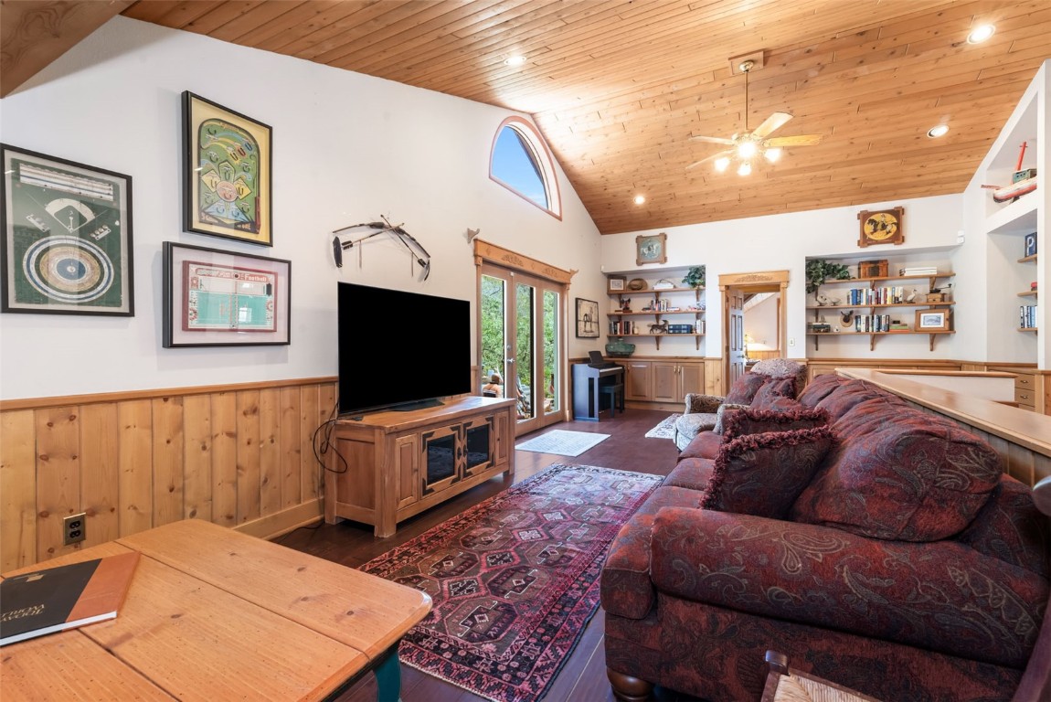 2300 Glacier Ridge Steamboat Springs, CO 80487 - Photo 31 of 50 a living room with furniture and a flat screen tv